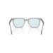 Sunglasses with light blue lenses and gray frame on a white background