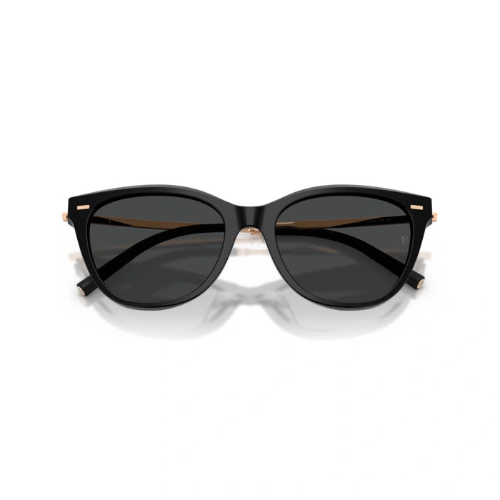 0OV5597SU Black cat-eye sunglasses on a white background 5