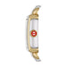 A two-tone yellow gold and white gold watch shown from the side, featuring a silver-toned rectangular case with a red and gold circular 'M' logo on the dial and a silver-toned wrap-around bracelet.