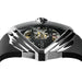 A close-up of a luxury skeleton watch with a black case, transparent dial showing the inner gold and silver mechanical movement, and a black strap on a white background.