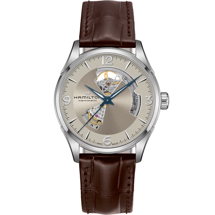 Hamilton watch with brown leather strap and silver case on white background
