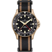 Hamilton watch with a black dial, black and tan striped nylon strap, and a bronze-toned case on a white background.