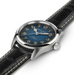 Hamilton Alumnus watch featuring a blue sunburst dial, gold-tone numerals and hands, and a black leather strap with white contrast stitching.