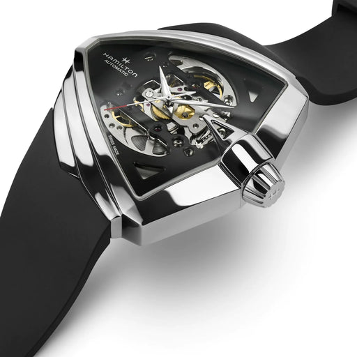 Hamilton watch with black strap and visible mechanical components on a white background