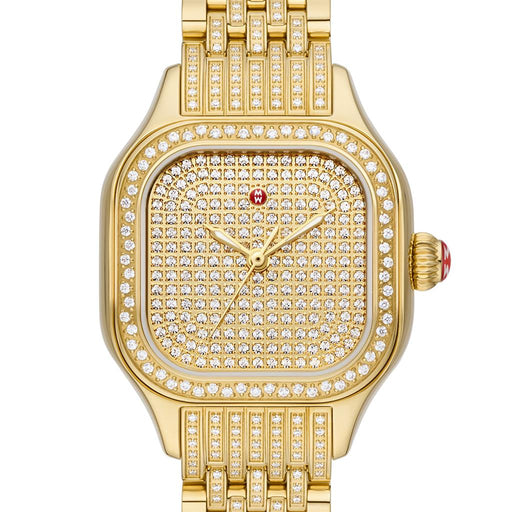 Gold watch with diamond accents on a white background