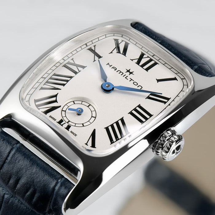 Hamilton watch with black leather strap and white face with Roman numerals