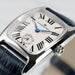Hamilton watch with black leather strap and white face with Roman numerals