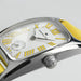 Hamilton watch with yellow accents on a light gray background