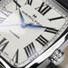 Hamilton watch face with Roman numerals and blue hands