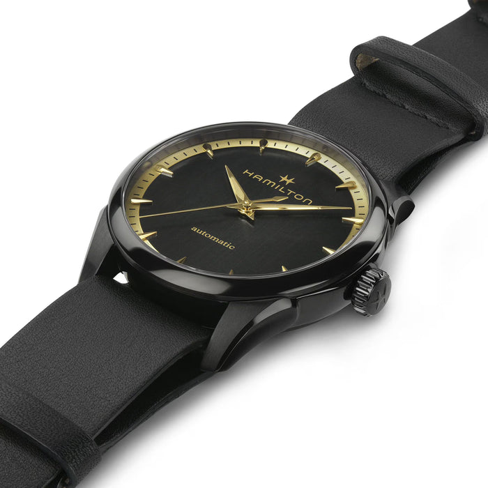 Hamilton watch with black strap and black dial on a white background