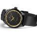 Black watch with gold accents on a white background