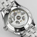 Close-up of a Hamilton watch with visible mechanical components on a light gray background