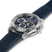 Hamilton watch with blue strap and navy dial on a white background