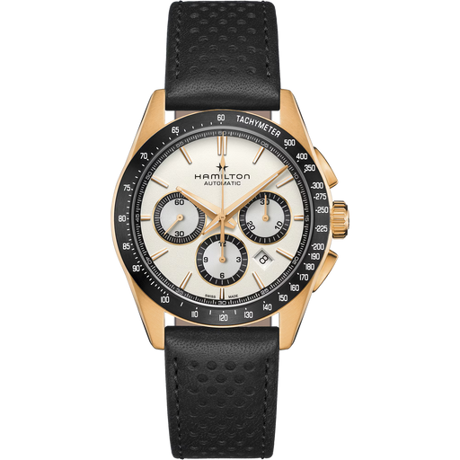Hamilton Automatic watch with a gold-tone case, black bezel, cream-colored dial, and a black perforated leather strap, shown against a plain white background.
