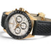 Hamilton watch with black leather strap and gold accents on a white background
