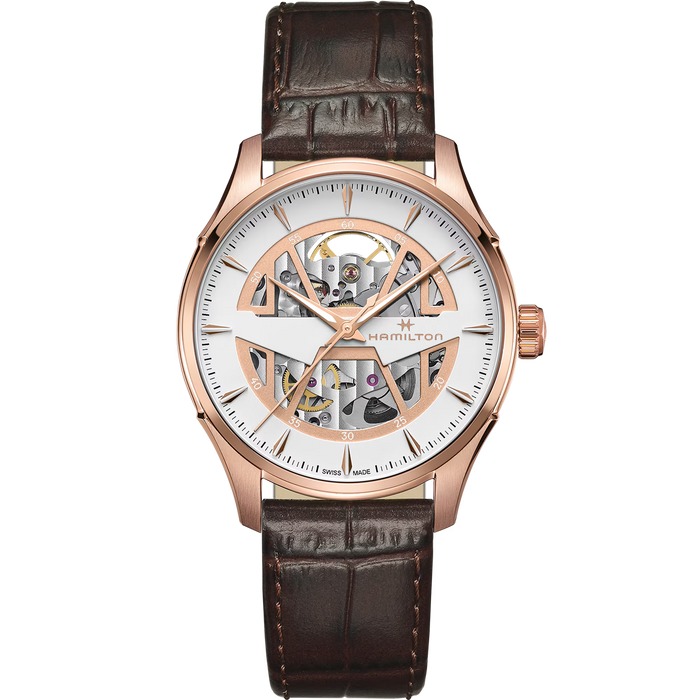 Hamilton watch with brown leather strap and rose gold case on white background
