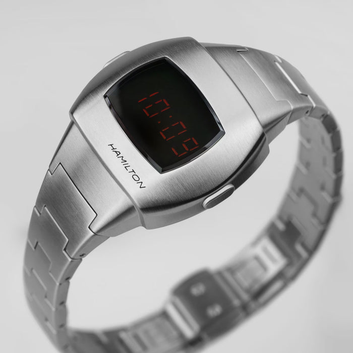 Silver Hamilton digital watch on a light gray background