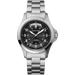 Hamilton watch with black dial and silver metal bracelet on a white background