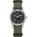 Watch with green strap and black dial on a white background