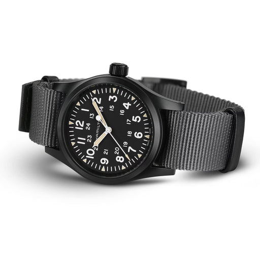 Black watch with a gray strap on a white background