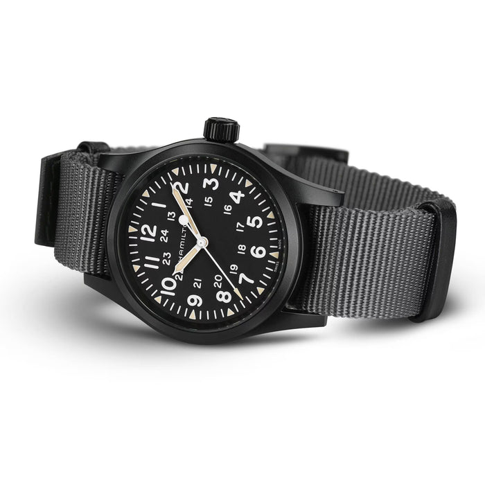 Black watch with a gray strap on a white background