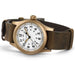 Watch with brown leather strap and gold casing on a white background