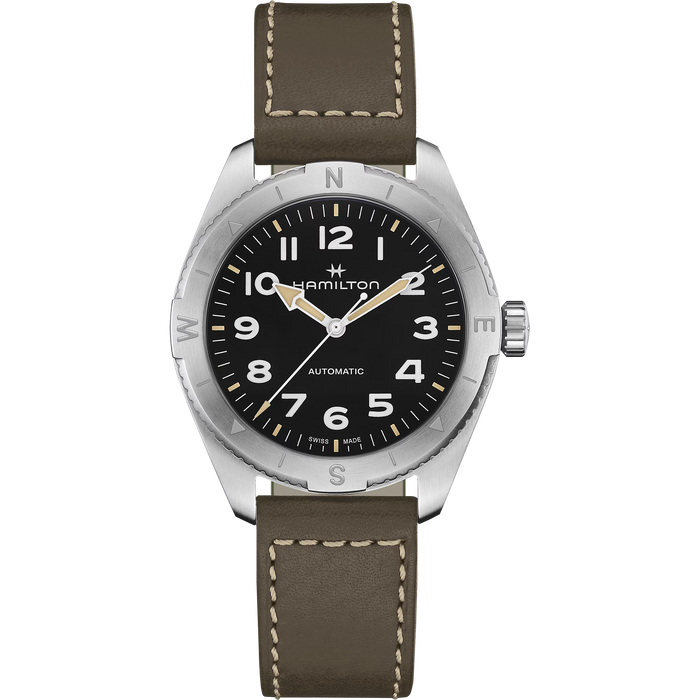 A Hamilton automatic wristwatch with a brown leather strap, silver-toned stainless steel case, and a black dial with white numerals and gold-tone hands.