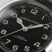 Hamilton watch face with black dial and gold accents