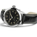 Hamilton watch with black dial and leather strap on a white background