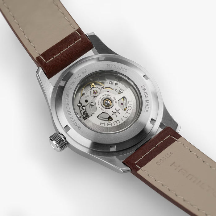 Hamilton watch with brown leather strap on a white background