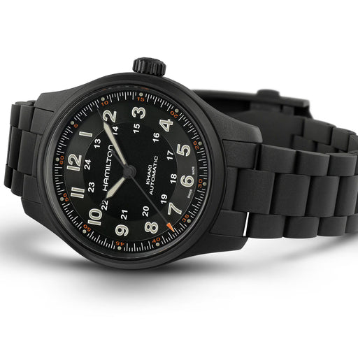 Black wristwatch with detailed face on a white background