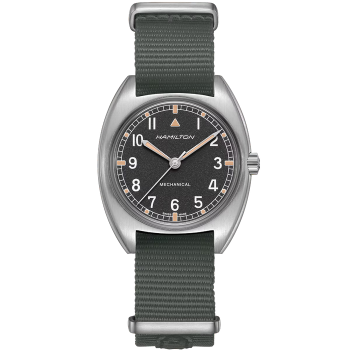 Hamilton watch with green strap and black dial on a white background