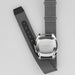 Hamilton watch with gray strap on a light gray background