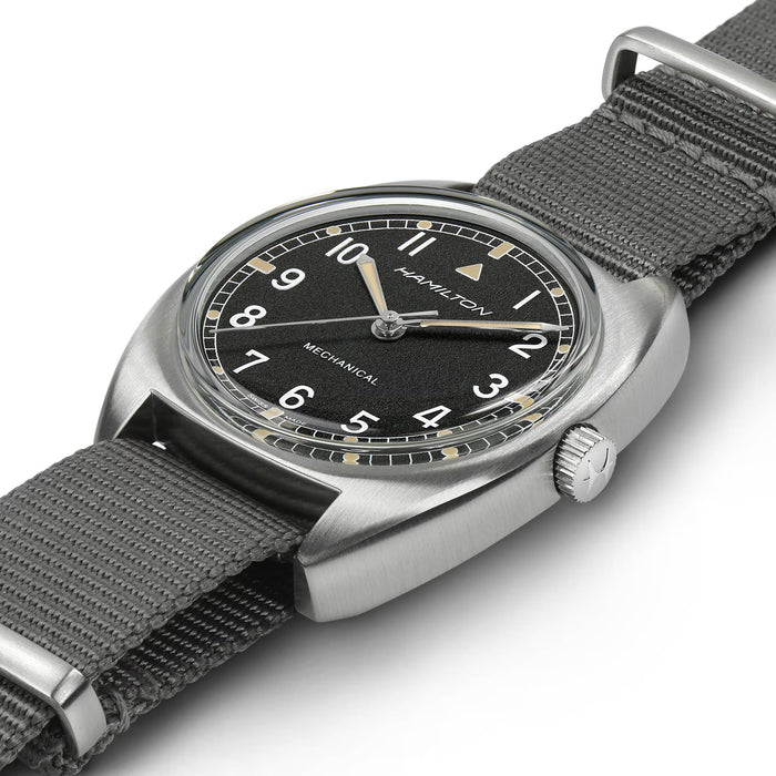 Hamilton watch with black dial and gray strap on a white background