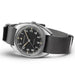 Hamilton watch with black dial and gray strap on a white background