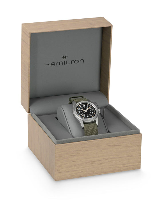 Hamilton watch in a wooden box on a white background