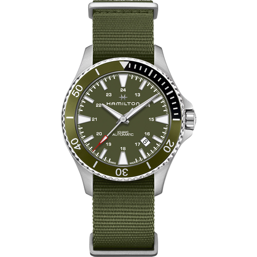 Hamilton watch with an olive green dial and matching green nylon strap, featuring a silver stainless steel case and a black rotating bezel.