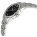 Silver watch with black dial on a white background