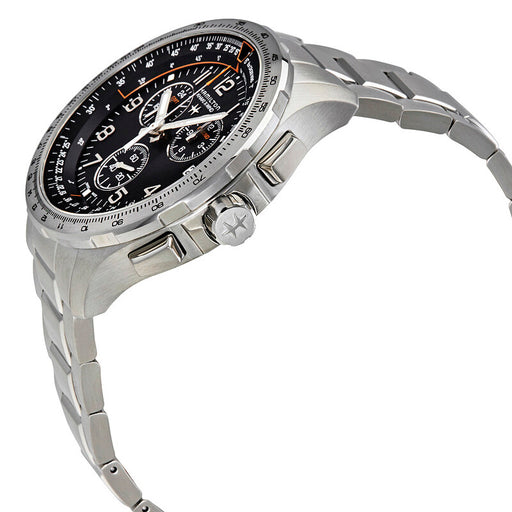Silver wristwatch with a black dial on a white background