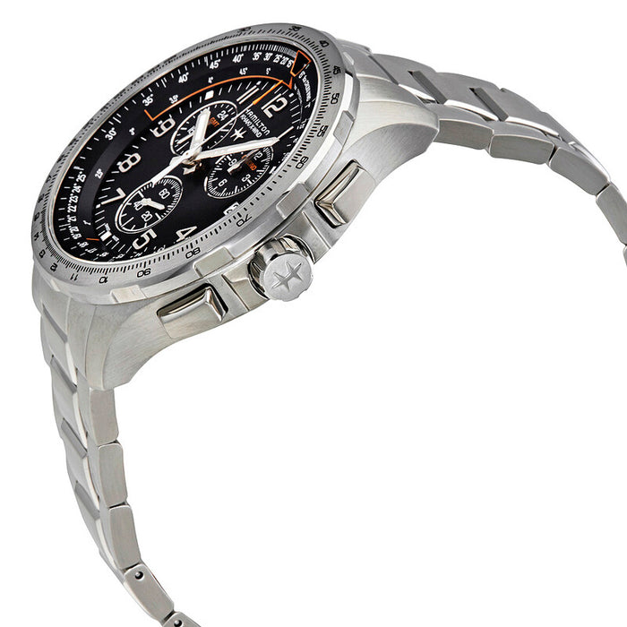 Silver wristwatch with a black dial on a white background