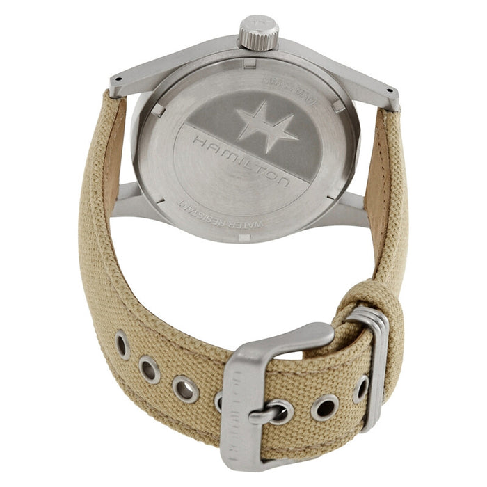 Close-up of a watch with a beige strap and silver case on a white background