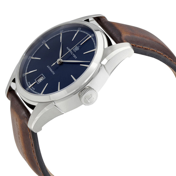 Hamilton watch with brown leather strap and blue dial on a white background